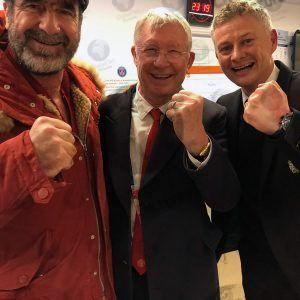 ERIC CANTONA AND SIR ALEX FERGUSON CELEBRATE WITH OLE GUNNAR SOLSKJAER AFTER MAN UTD BEAT PSG TO GO THROUGH TO THE CHAMPIONS LEAGUE QUARTER-FINAL