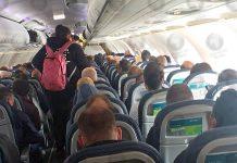 Aer Lingus passengers crammed onto Belfast to London flight with no social distancing