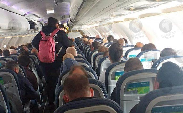 AER LINGUS PASSENGERS CRAMMED ON BELFAST TO LONDON FLIGHT DURING CORONAVIRUS PANDEMIC