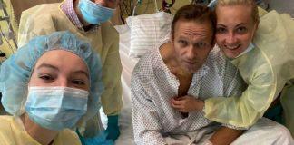 Poisoned Putin rival Alexei Navalny is now sitting up in hospital