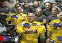 Russian cosmonauts show support for Ukraine wearing yellow and blue spacesuits