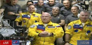 Russian cosmonauts show support for Ukraine wearing yellow and blue spacesuits